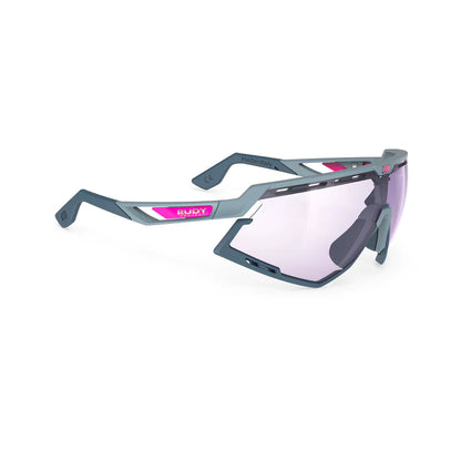 LUNETTE DEFENDER   Couleur : Glacier Matte Frame With ImpactX Photochromic 2 Laser Purple Lenses Blue Bumpers 2026