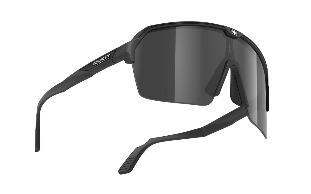 Spinshield Eyewear Color: Matte black frame with smoked black lenses. 2026