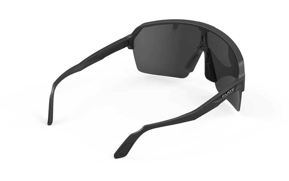 Spinshield Eyewear Color: Matte black frame with smoked black lenses. 2026